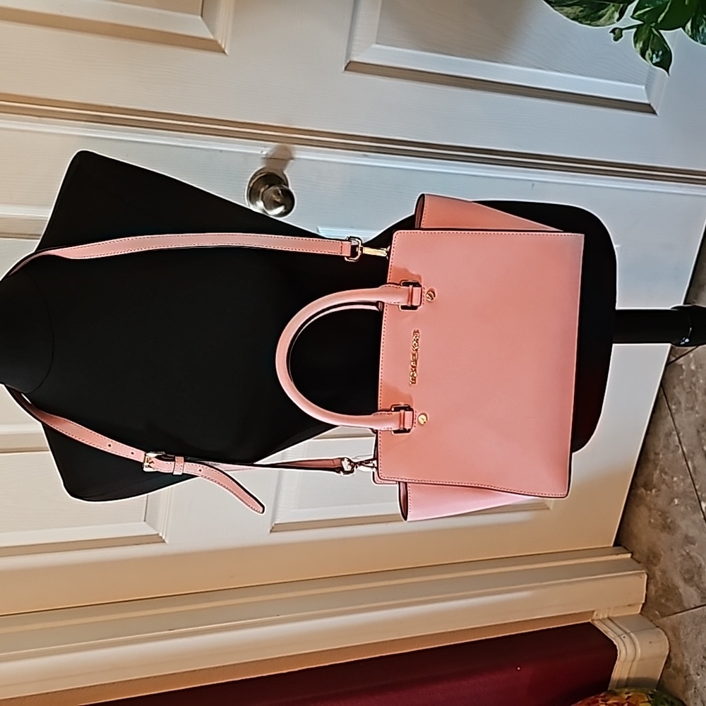 New Michael Kors leather purse with gold hardware.